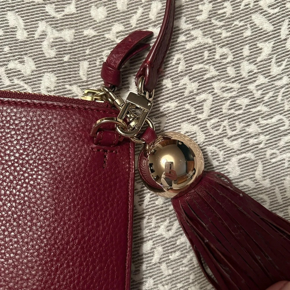Tory Burch Tassel Crossbody purse,  Garnet - Picture 4 of 7